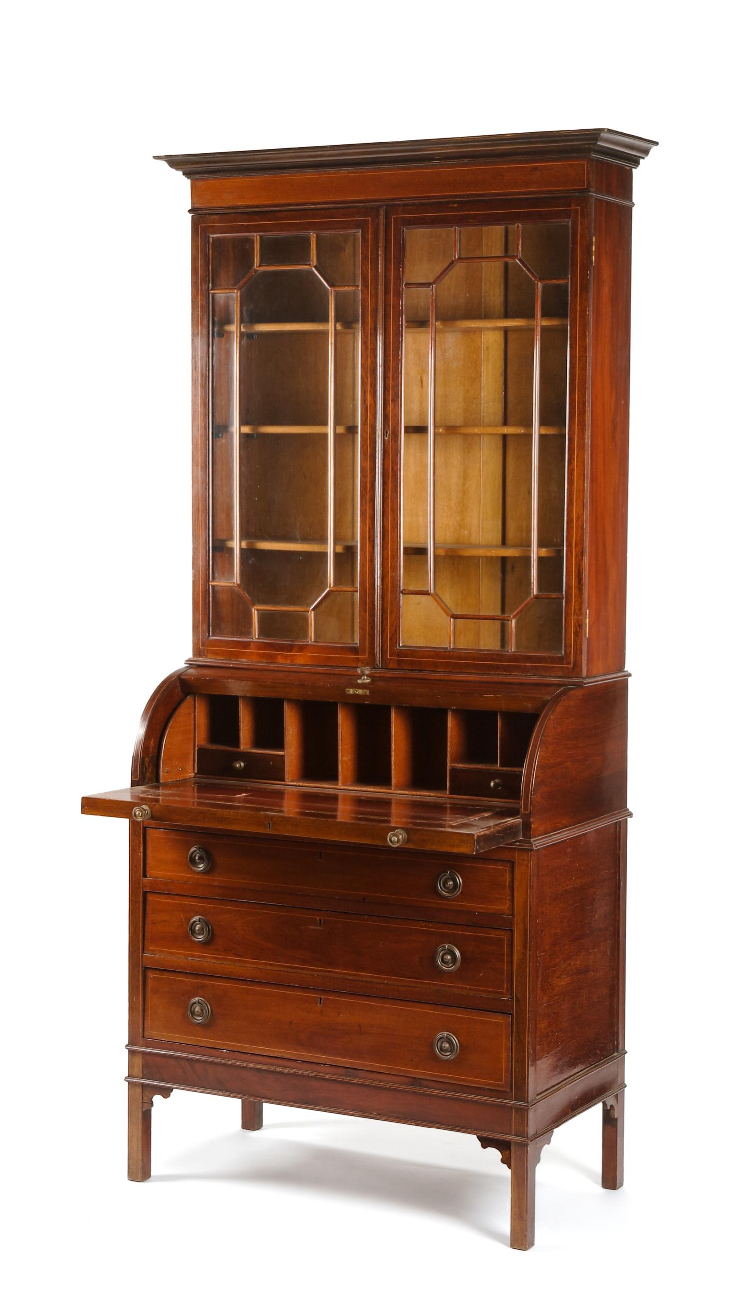 A George III Style Mahogany Cylinder Secretary Bookcase Height 90 x width 34 1/2 x depth 18 1/4 inches. — LATE 19TH/EARLY 20TH CENTURY