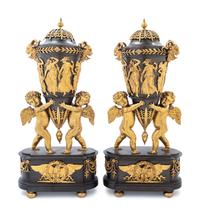 A Pair of Directoire Revival Gilt and Patinated Bronze Urn Ornaments