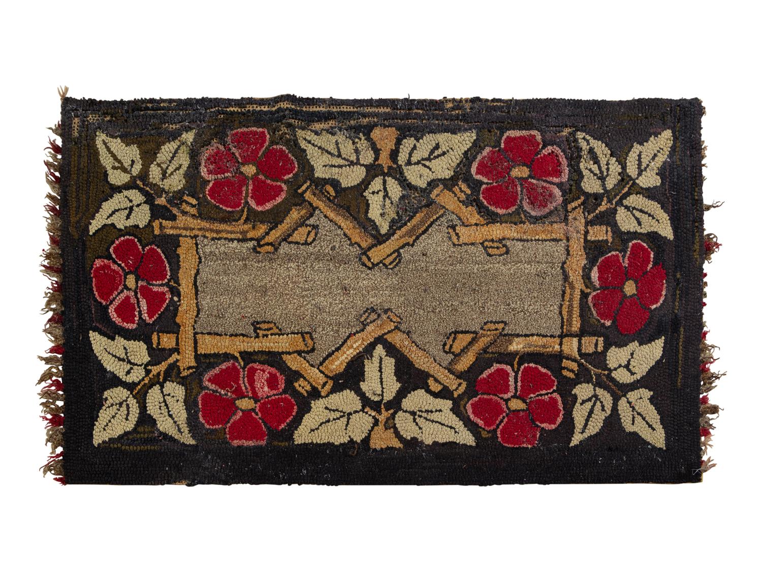 A Flower and Twig Decorated Hooked Rug