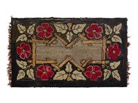 A Flower and Twig Decorated Hooked Rug