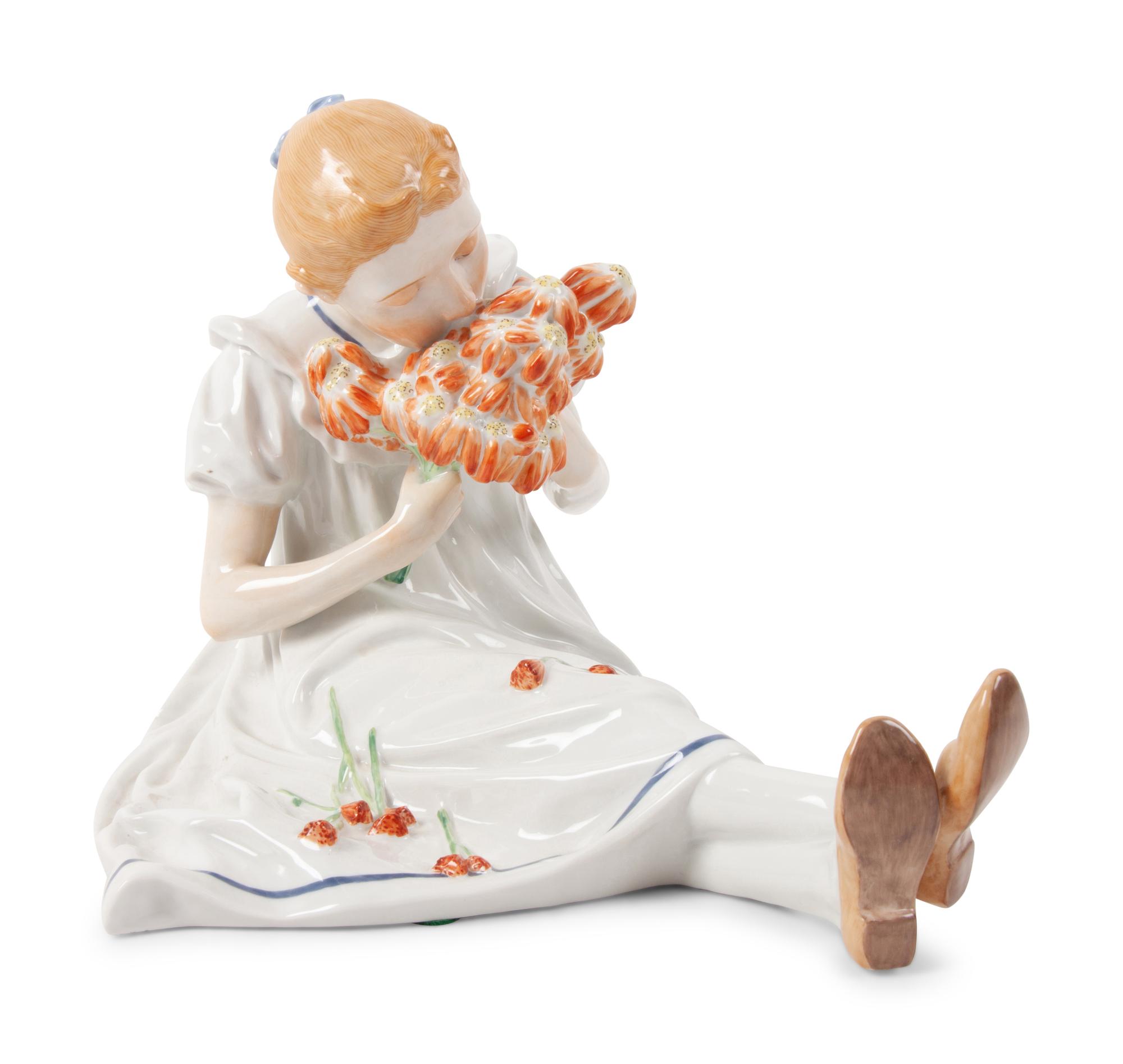 A Meissen Porcelain Figure of a Seated Girl with Flowers by Konrad Hentschel