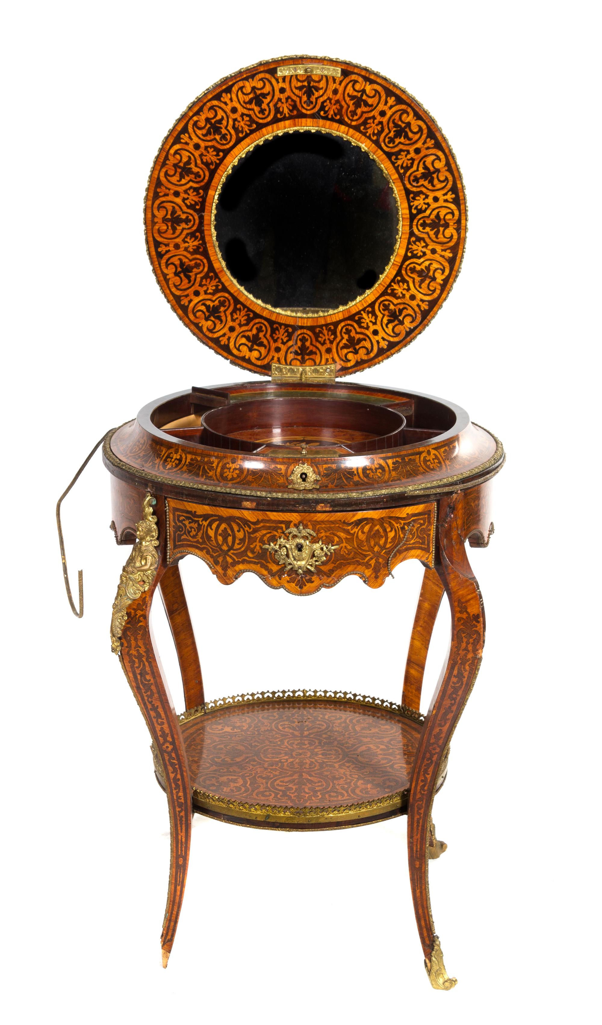 A Louis XV Style Gilt Bronze Mounted Marquetry Work Table Height 30 x diameter of top 24 inches. — 19TH CENTURY