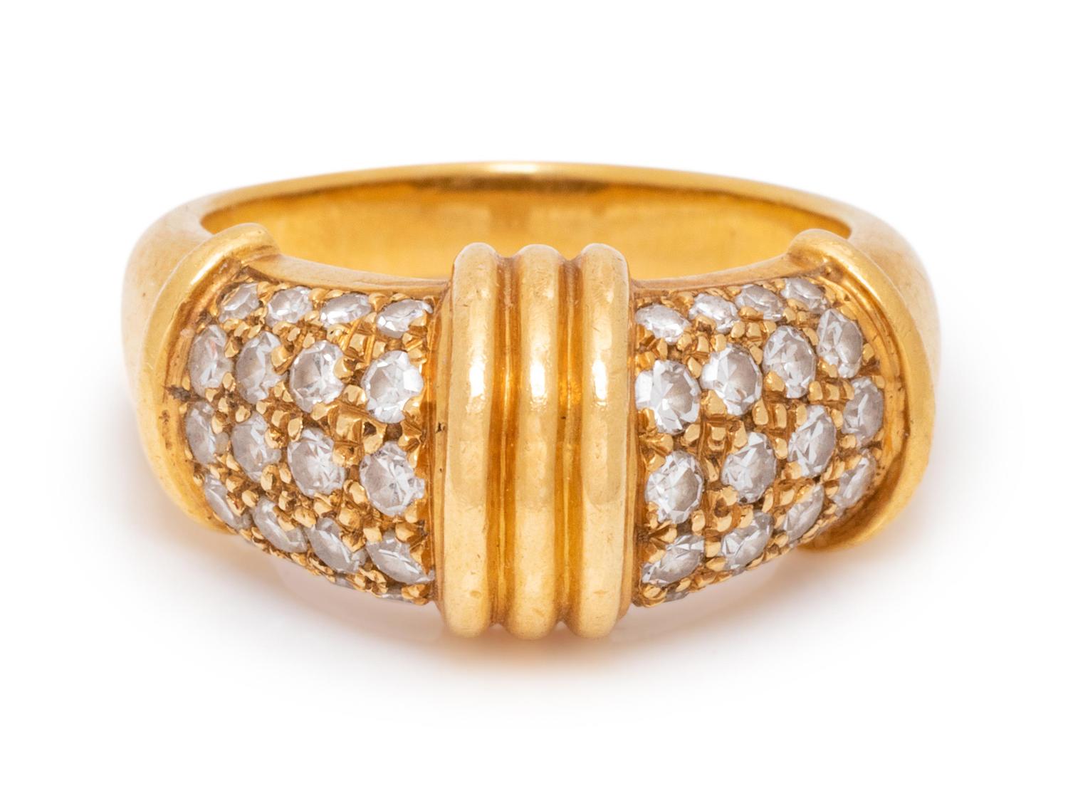 An 18 Karat Yellow Gold and Diamond Ring,