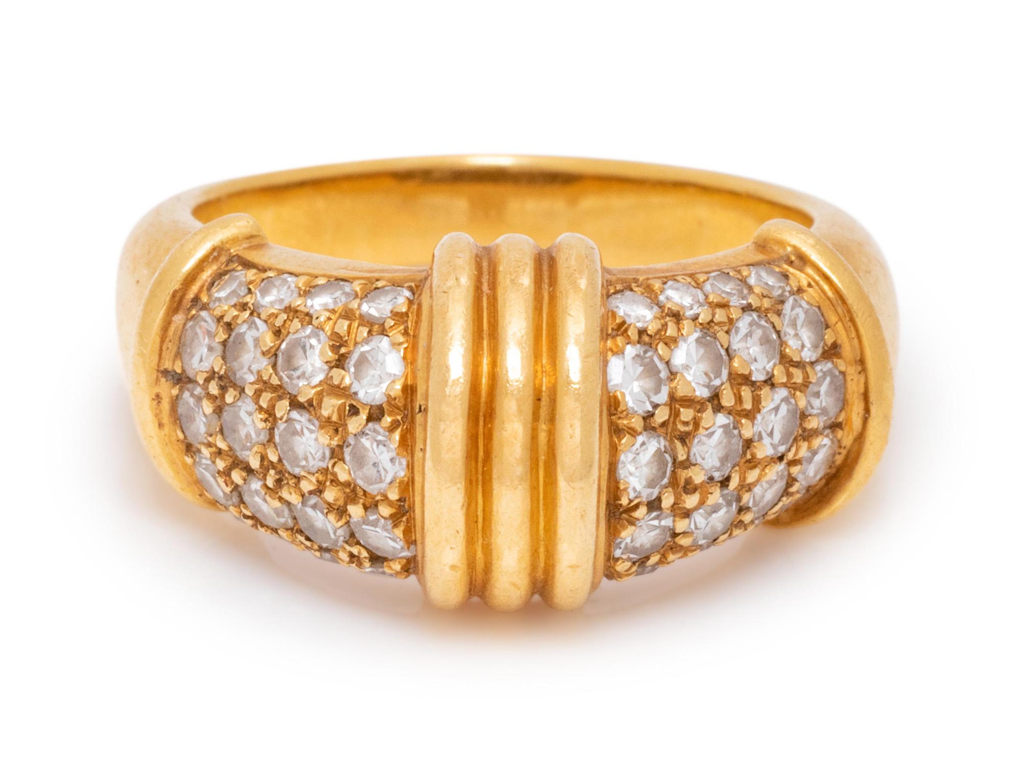 An 18 Karat Yellow Gold and Diamond Ring,