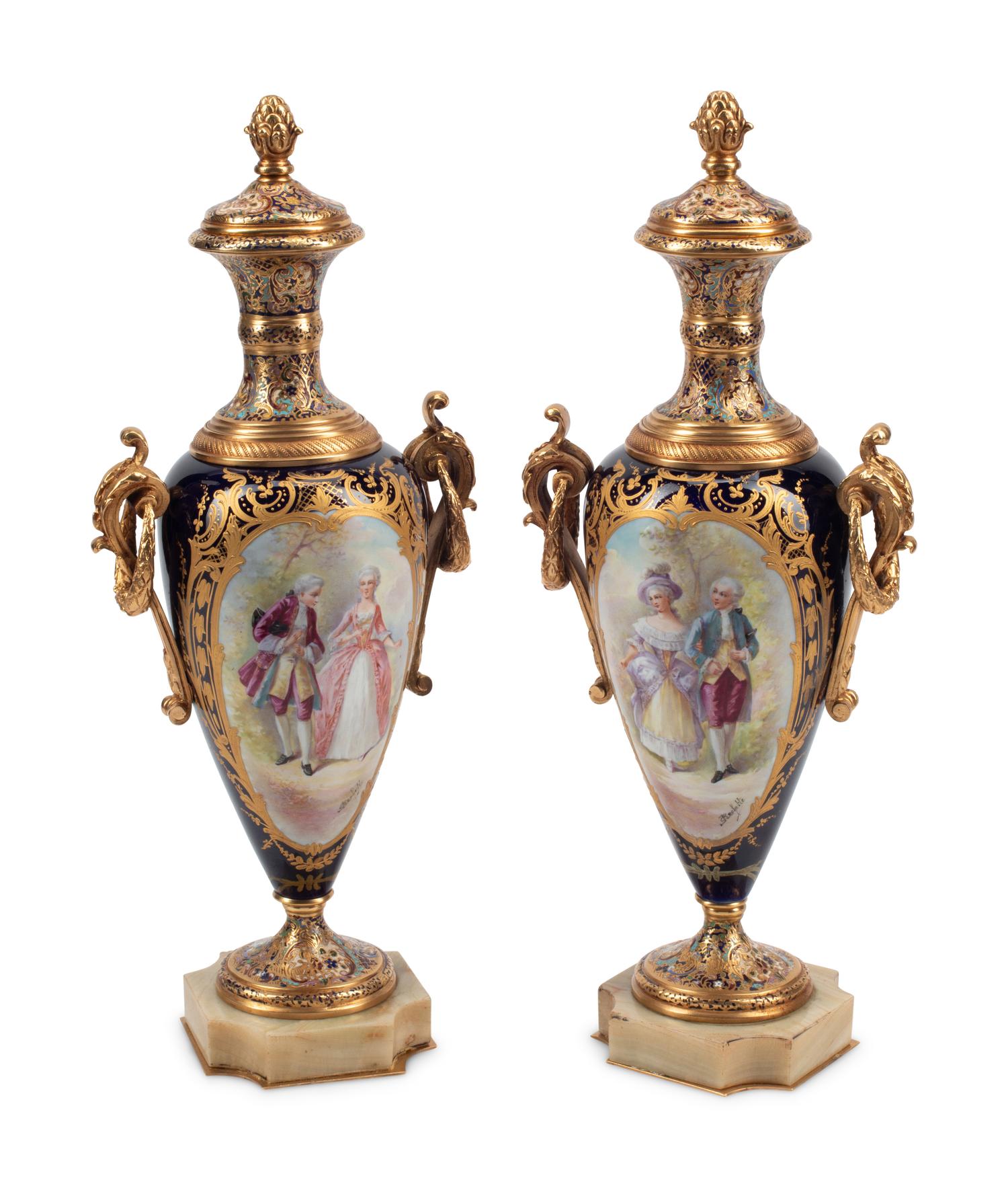 A Pair of Gilt Bronze Mounted Sèvres Style Porcelain, Onyx and Champlevé Urns