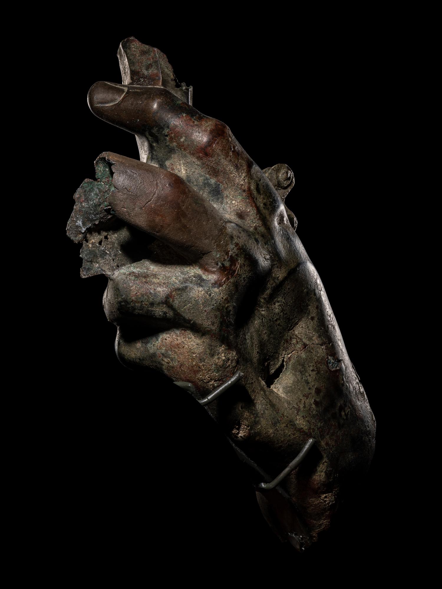 A Roman Bronze Hand Holding a Sword