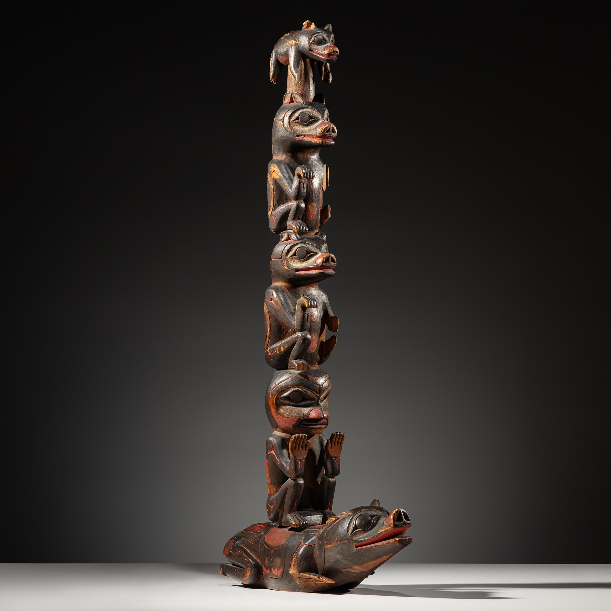 Haida Carved Totem Pole and Bear Cub