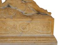 A Pair of Marble Models of Sleeping Cherubs on Plinths