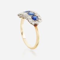 A sapphire, diamond, and gold ring