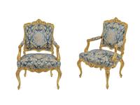 A Pair of Louis XV Style Giltwood Fauteuils — 20TH CENTURY