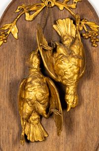 A Pair of Gilt Bronze and Walnut Hunt Plaques
