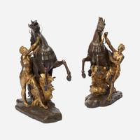 After Guillaume Coustou (French, 1677-1746) A Pair of Gilt and Patinated Bronze Models of the Marly Horses, 19th century