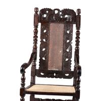 A William and Mary Swan-and-Leaf Carved and Cane Upholstered Oak Armchair