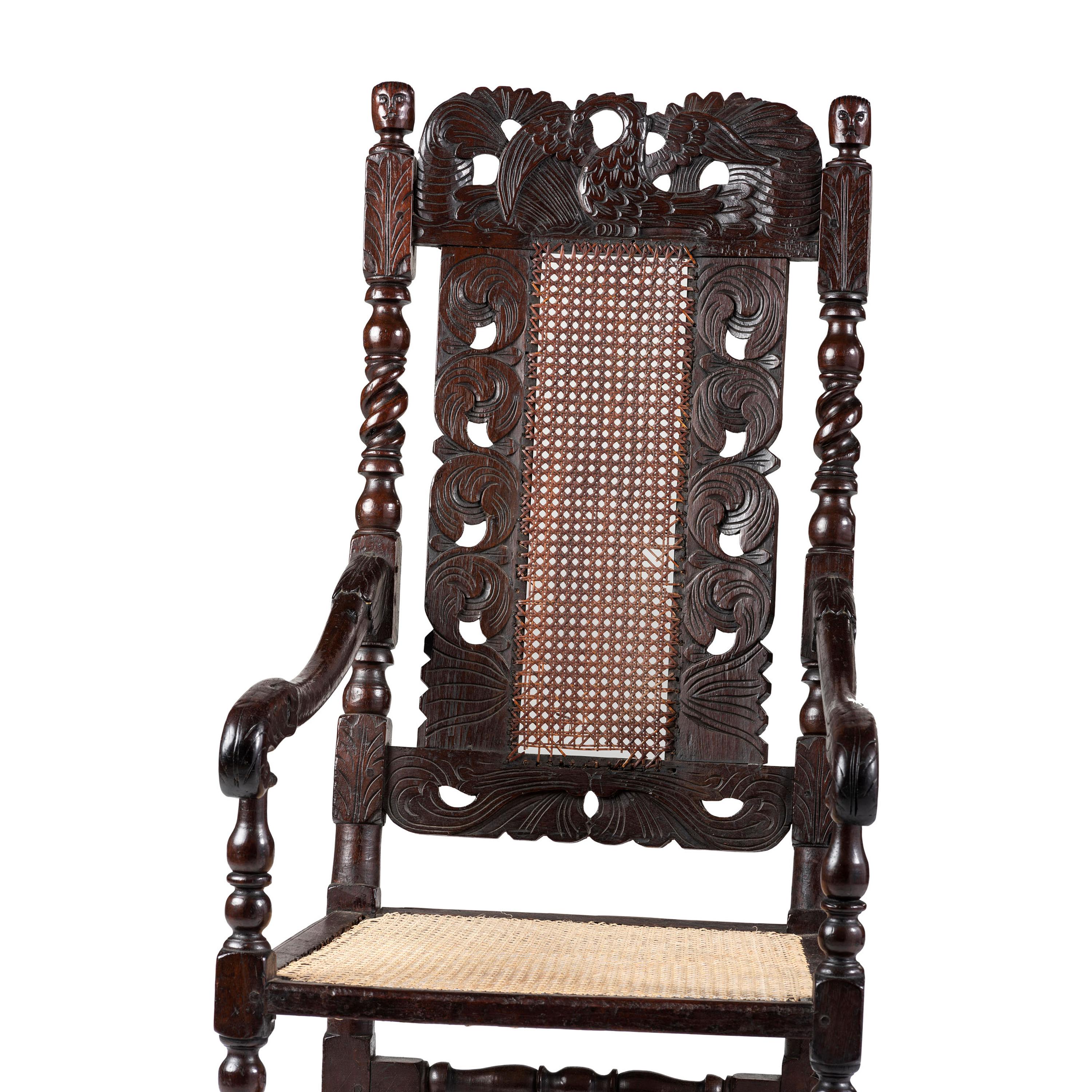 A William and Mary Swan-and-Leaf Carved and Cane Upholstered Oak Armchair