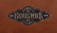 A Brunswick Ashbee Mahogany Pool Table and Chair
