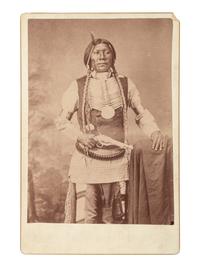 [NATIVE AMERICANS]. Cabinet card of "Big Jim" posed with a Forehand and Wadsworth Army revolver.