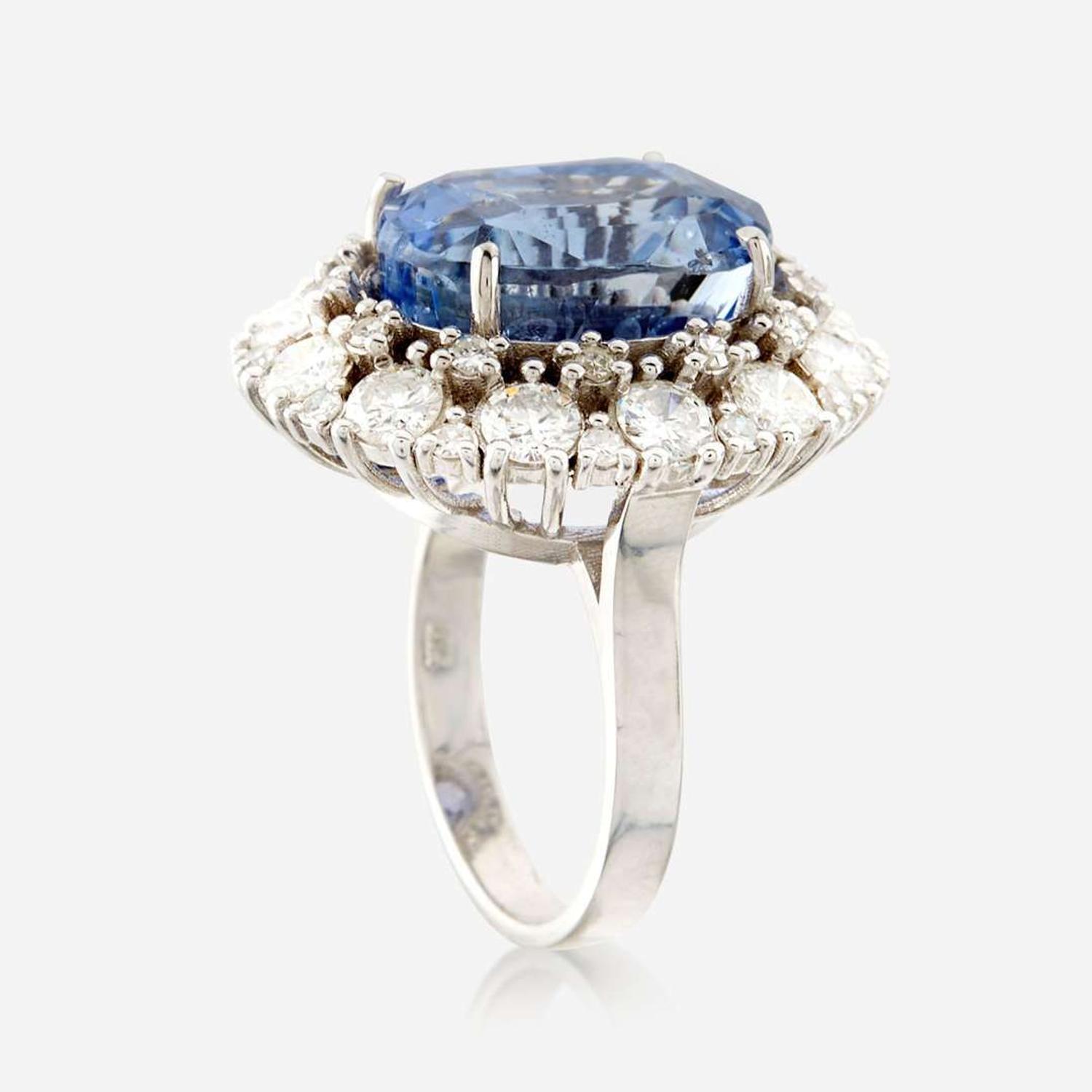 A sapphire, diamond, and white gold ring