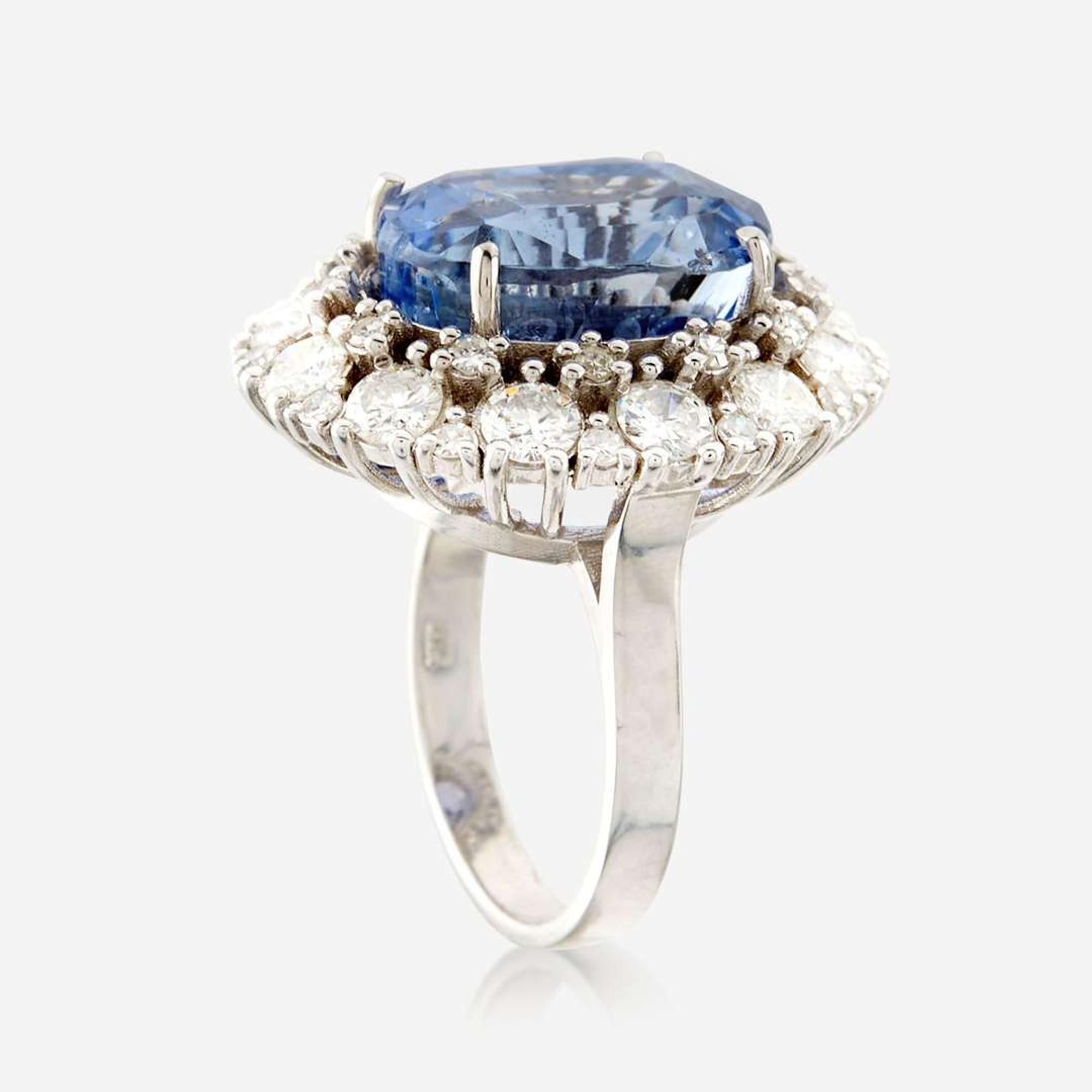 A sapphire, diamond, and white gold ring