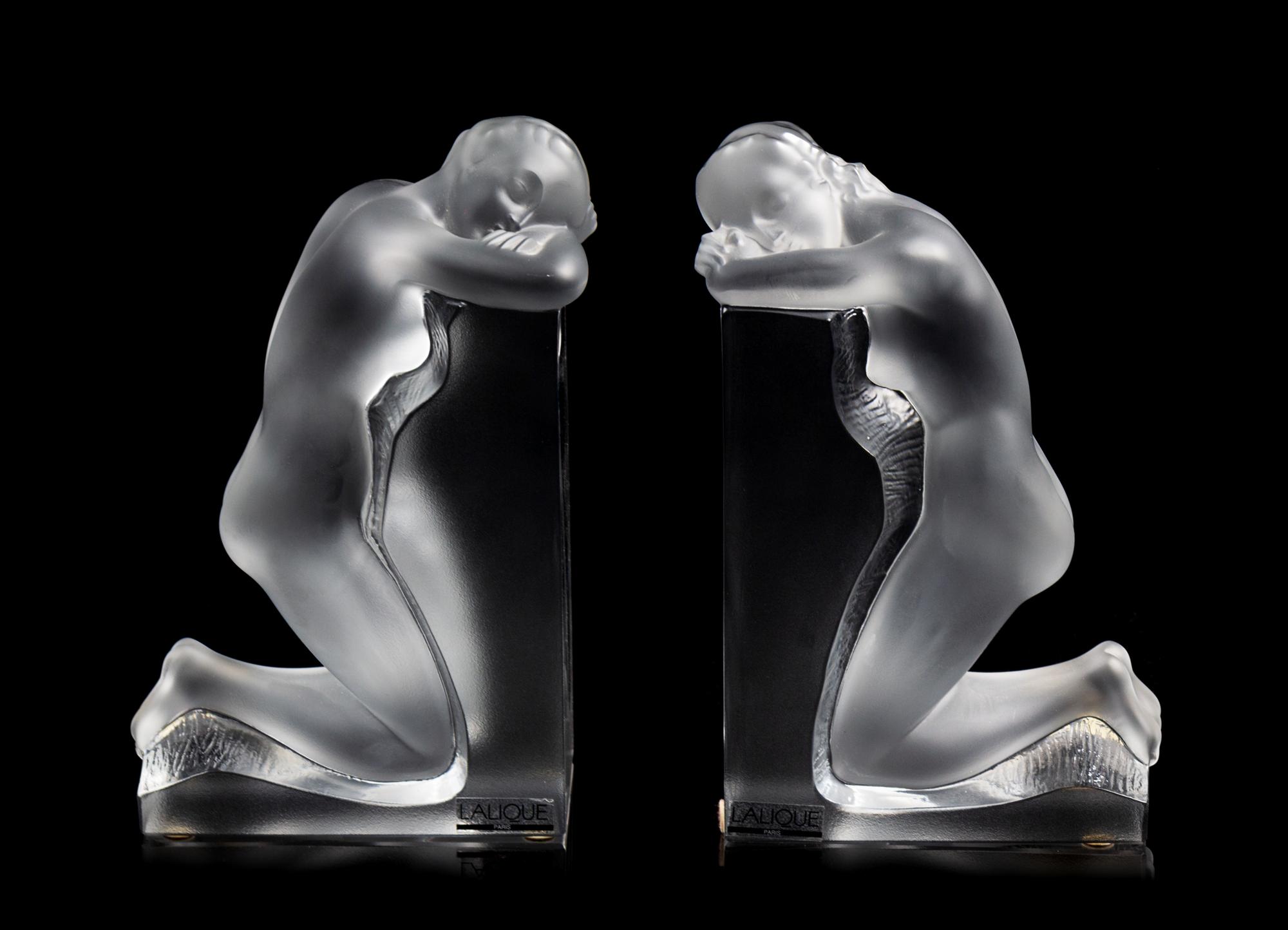 A Pair of Lalique Reverie Bookends Height 8 5/8 x width 5 1/4 x depth 2 inches