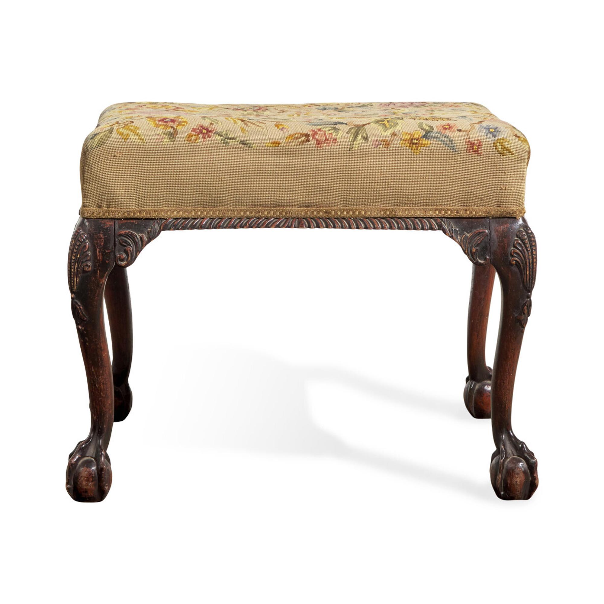 A George III Style Carved Mahogany Stool with Needlepoint Upholstery