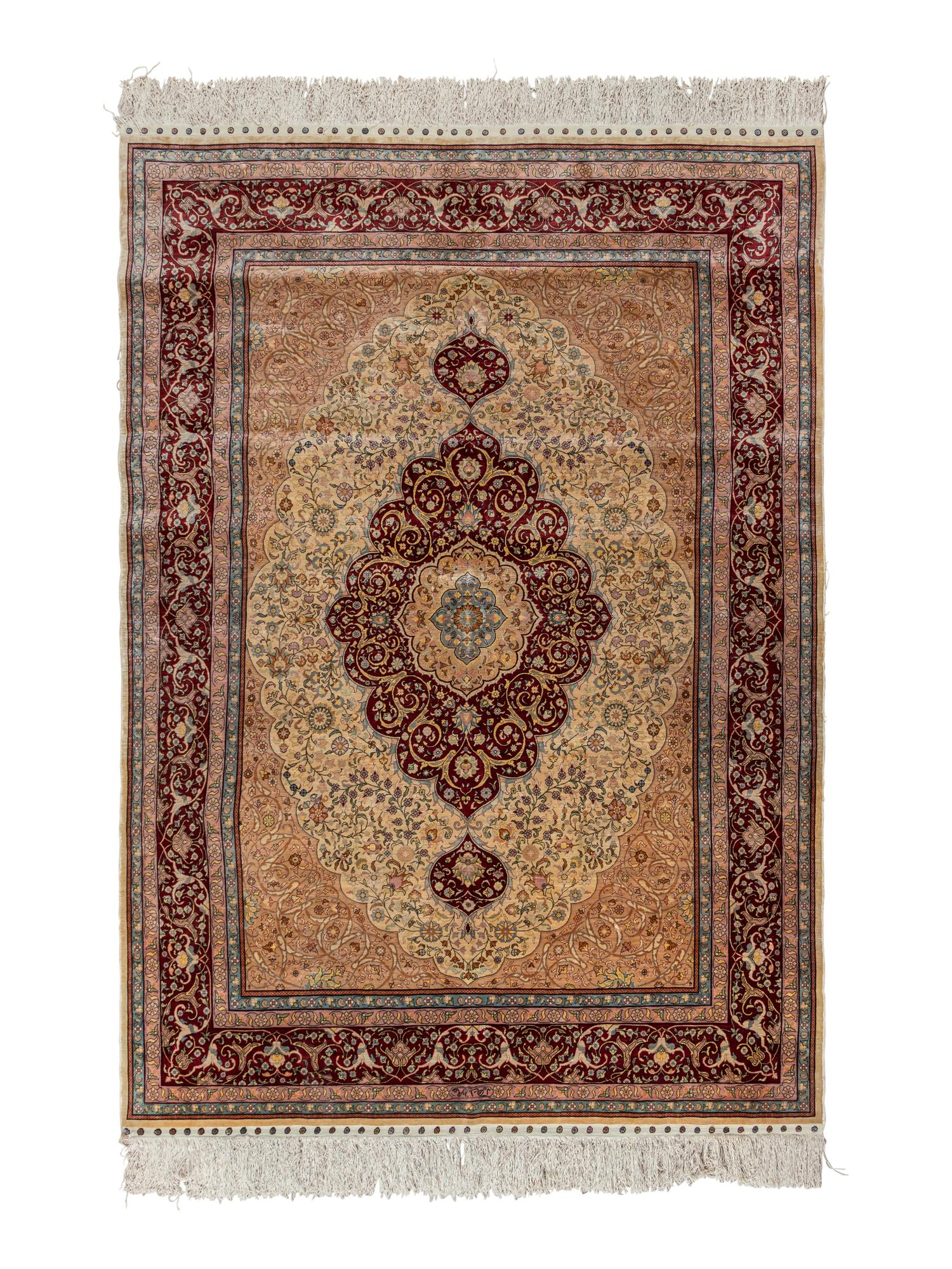 A Signed Tabriz Silk Rug