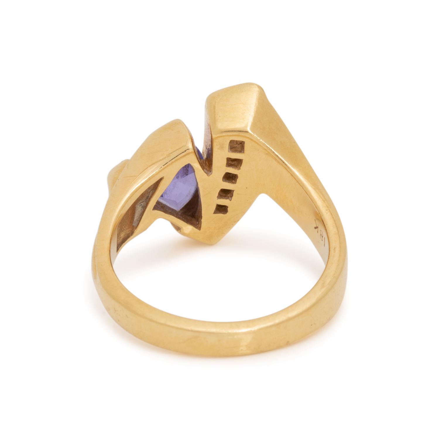 JOHN ATENCIO, TANZANITE AND DIAMOND RING