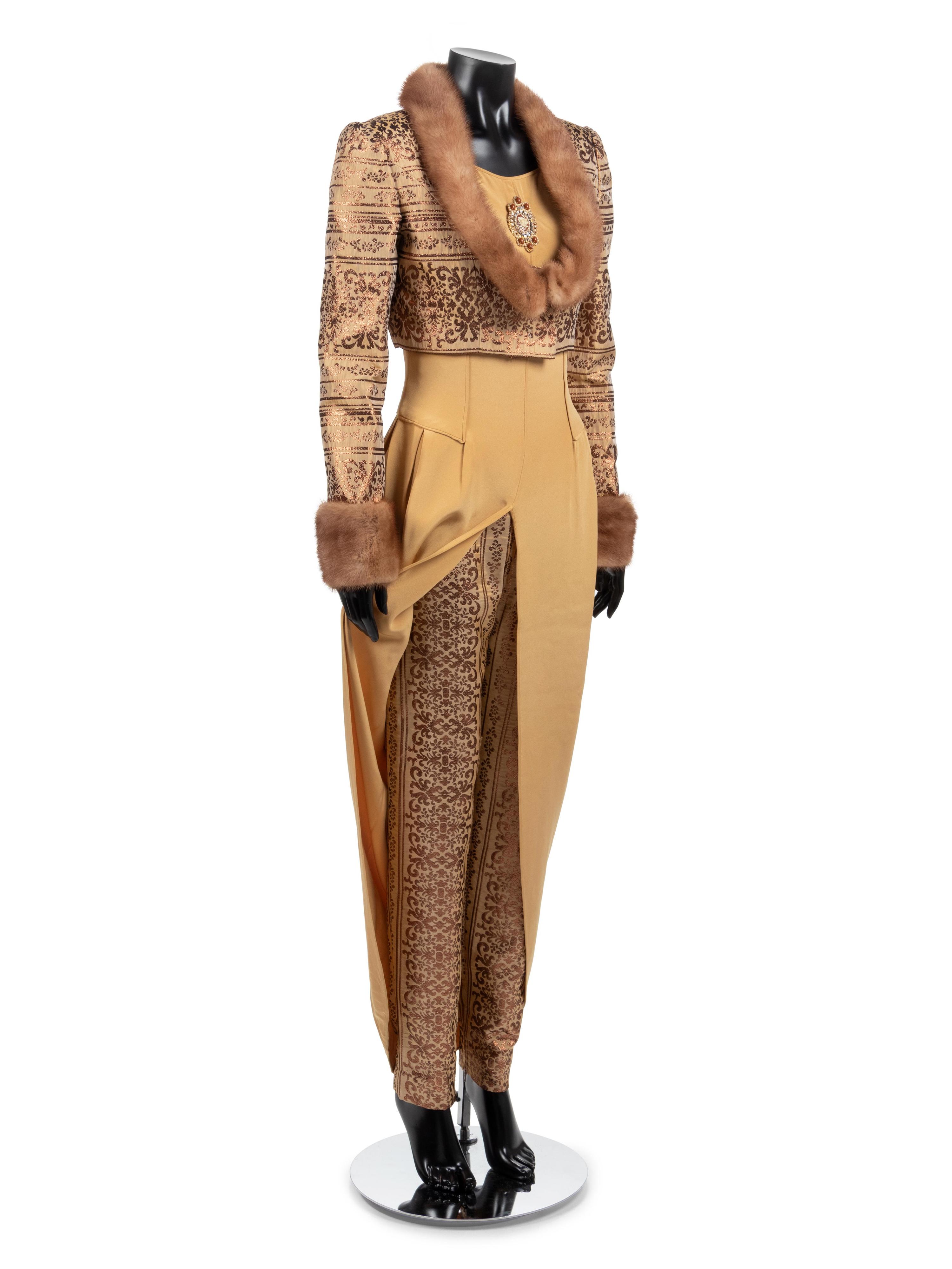 Sarli Evening ensemble, with fur trimmed crop jacket, pants, and yellow dress.