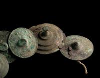 A Group of 15 Luristan Bronze Lids or Discs
