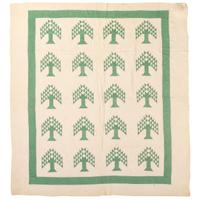 A Green and White Tree of Life Quilt
