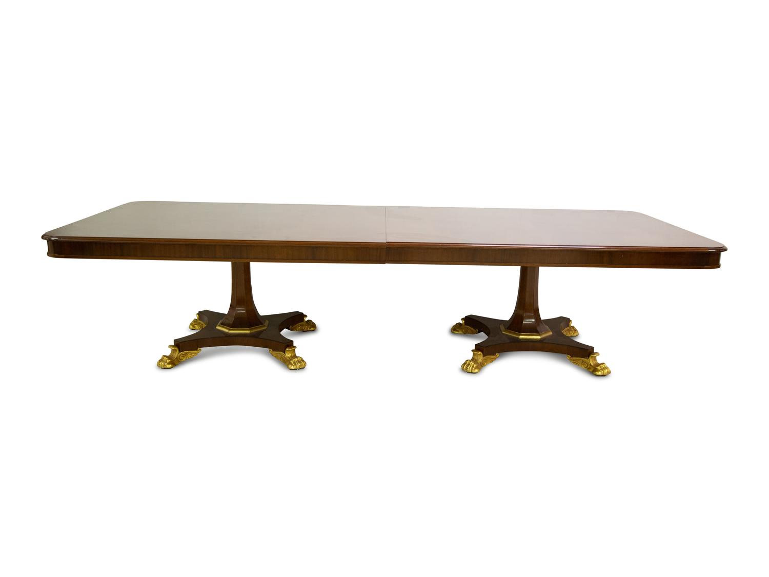 A Regency Style Mahogany and Parcel Gilt Twin Pedestal Dining Table — 20th Century