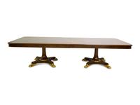 A Regency Style Mahogany and Parcel Gilt Twin Pedestal Dining Table — 20th Century
