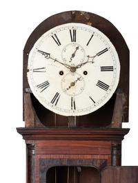 A Chippendale Inlaid and Figured Mahogany Tall Case Clock