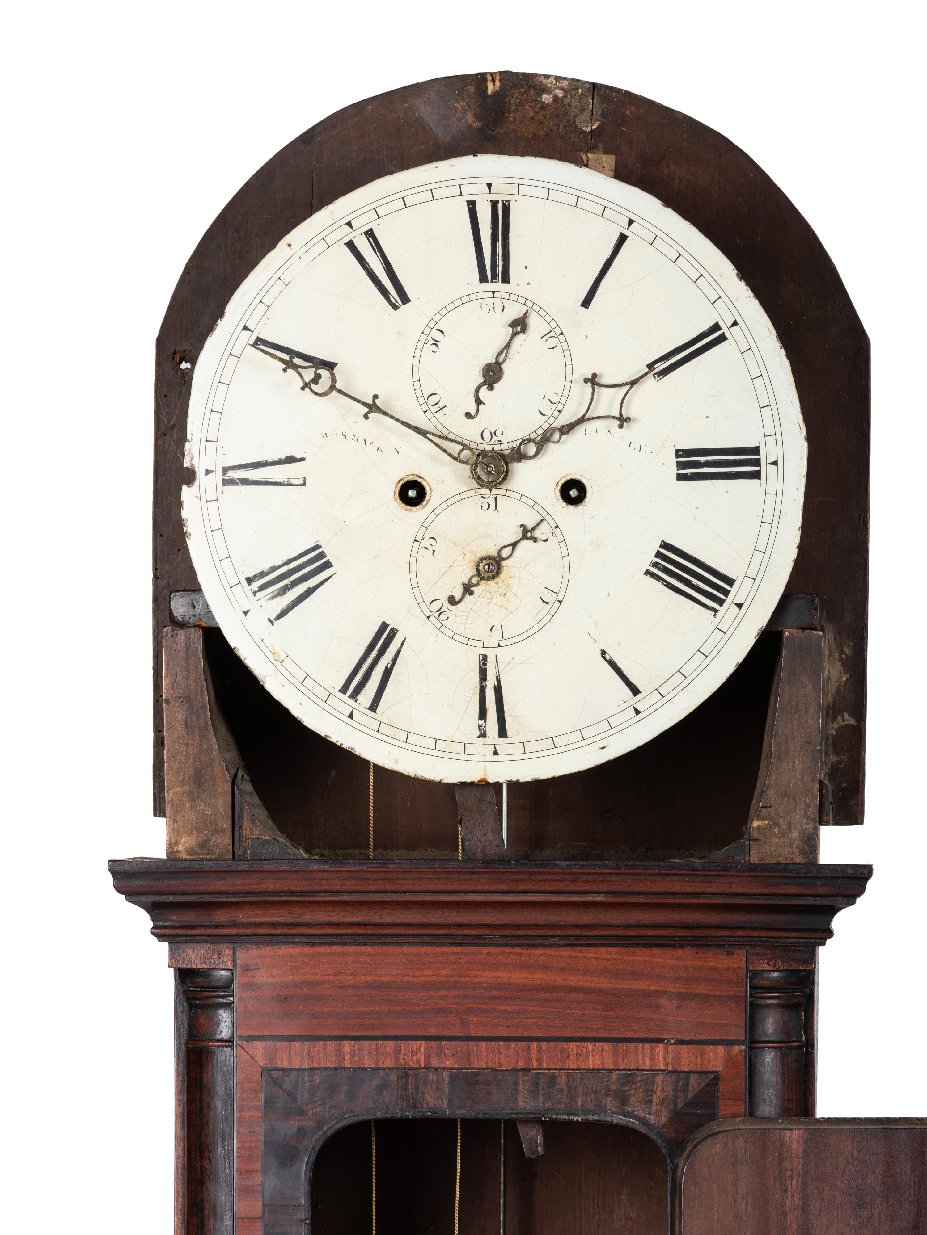 A Chippendale Inlaid and Figured Mahogany Tall Case Clock