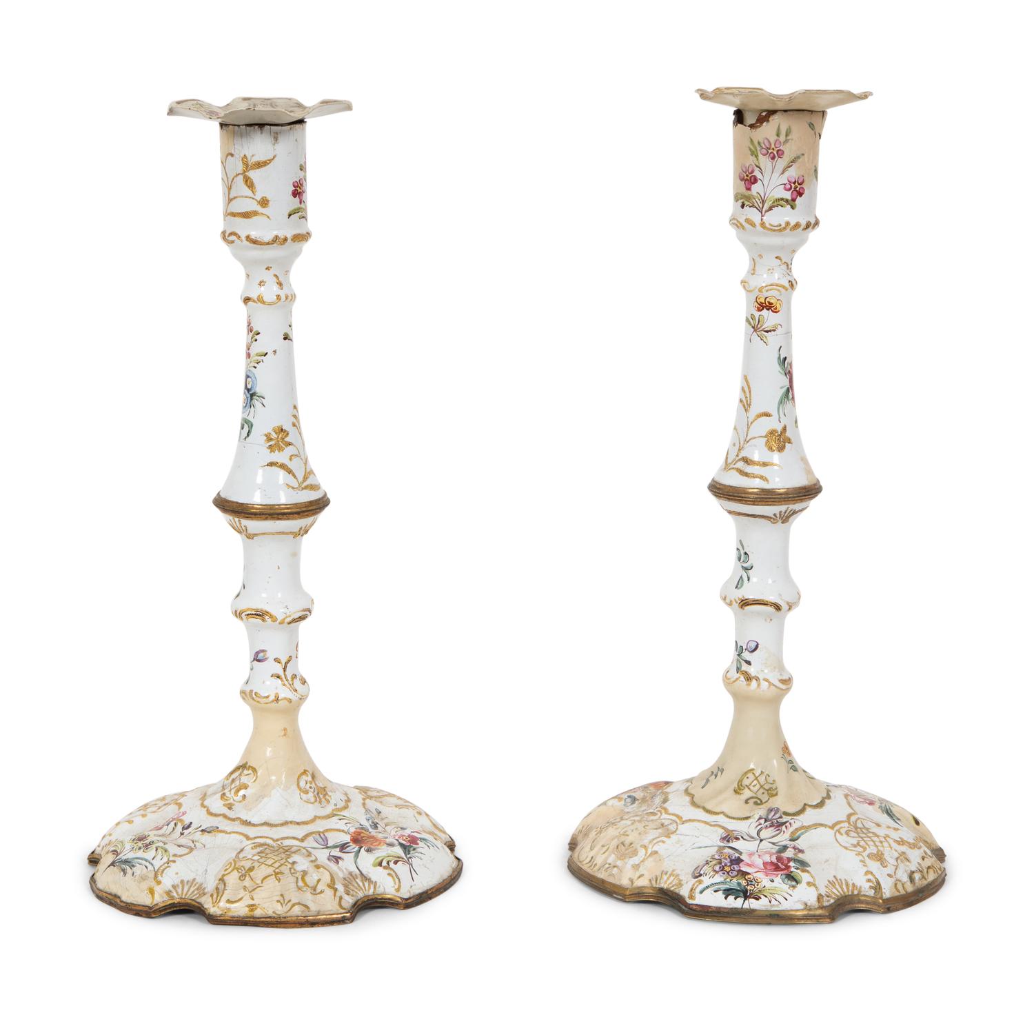 A Pair of Battersea Enameled Candlesticks