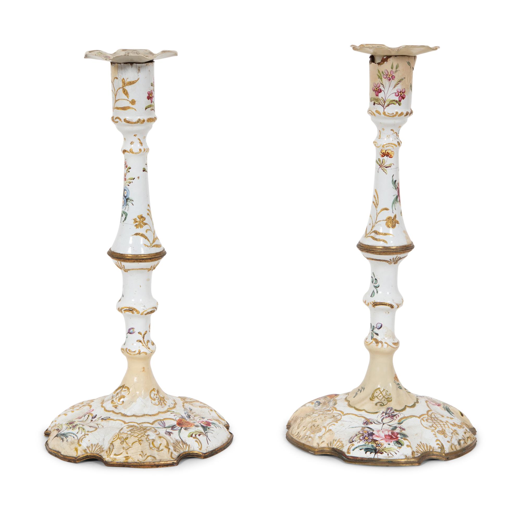 A Pair of Battersea Enameled Candlesticks