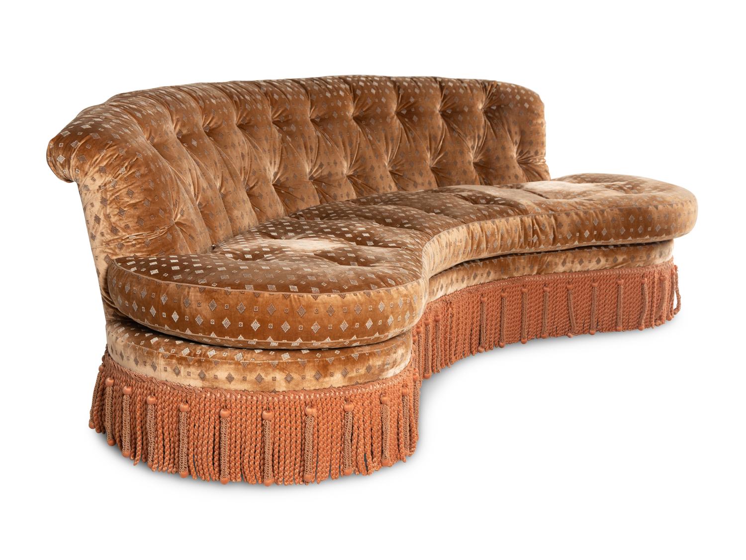 A Button-Tufted Velvet-Upholstered Reniform Sofa with Bullion Fringe