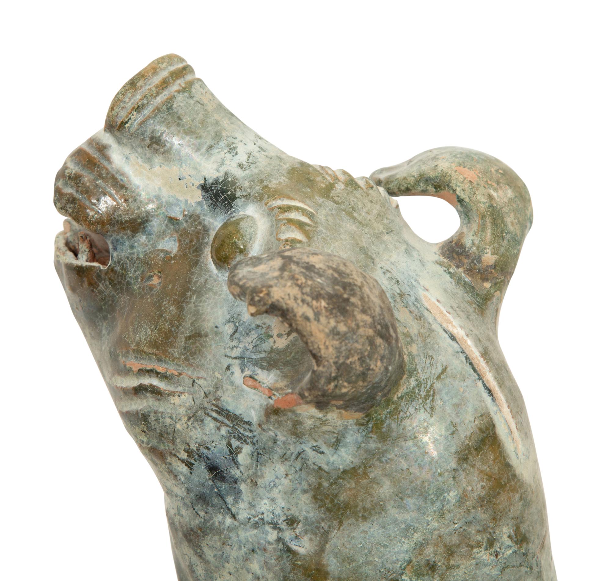 Two Chinese Glazed Pottery Dogs