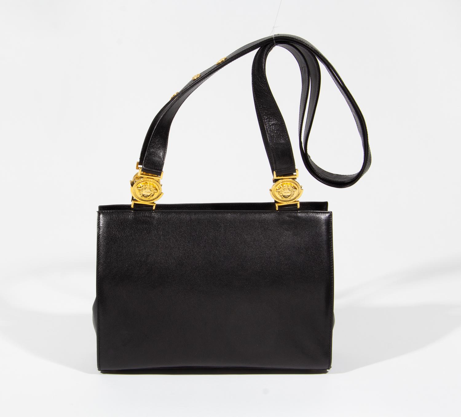 A Gianni Versace Black Leather Medusa Shoulder Bag, 11.75" x 8.5" x 3.5"; Strap drop: 19.5".