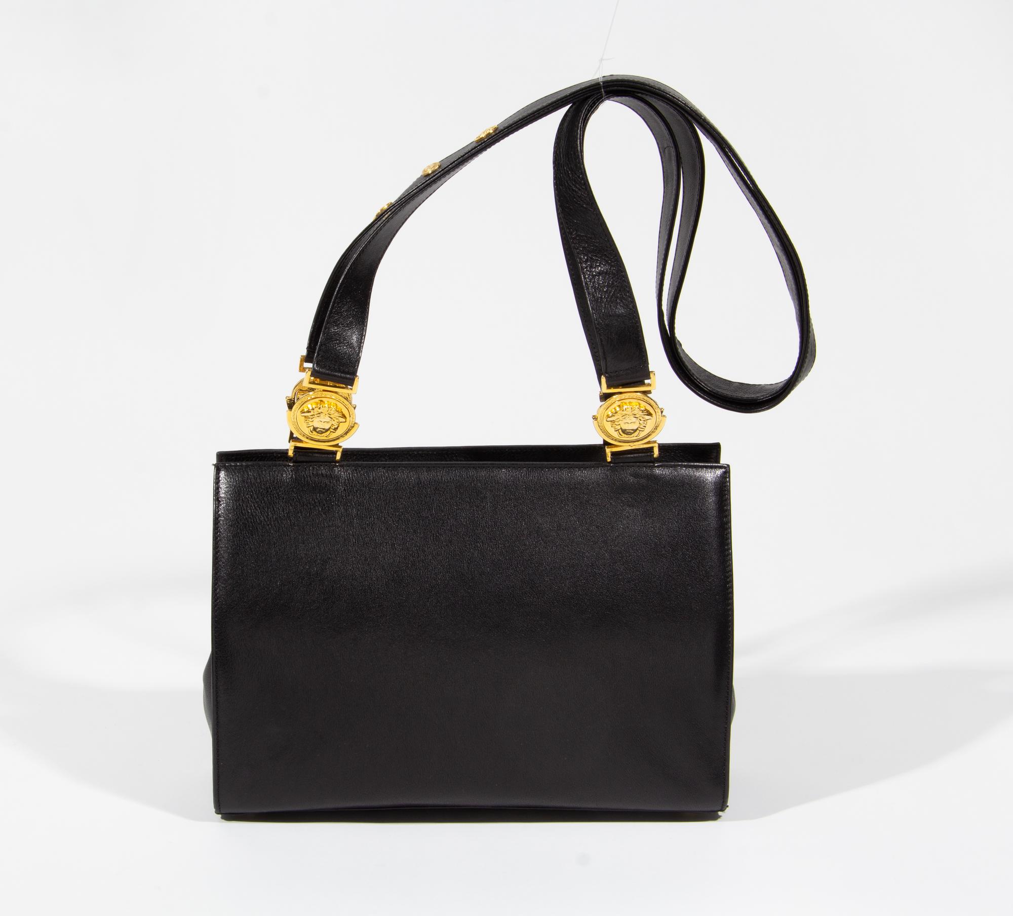 A Gianni Versace Black Leather Medusa Shoulder Bag, 11.75" x 8.5" x 3.5"; Strap drop: 19.5".