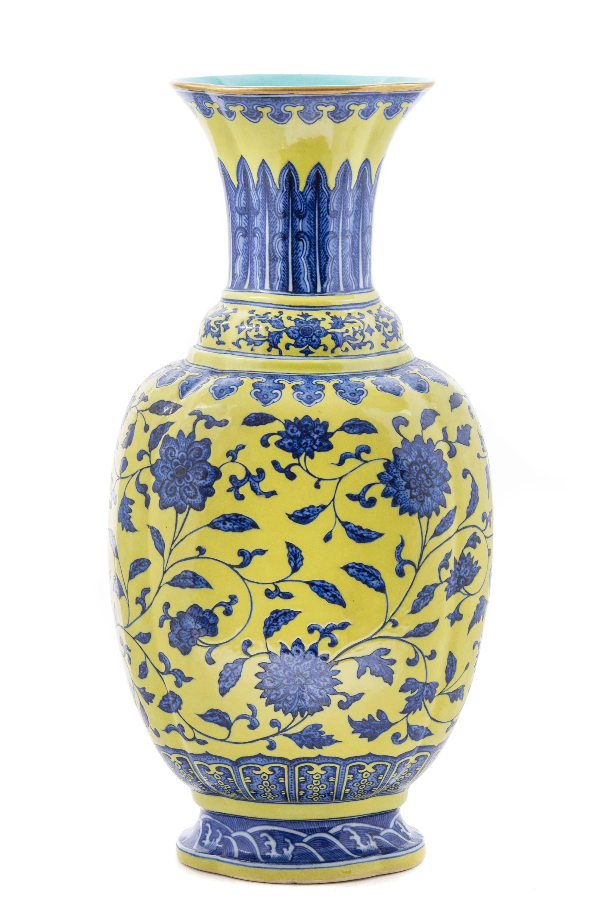 A Yellow and Underglazed Blue Porcelain Vase Height 19 inches.