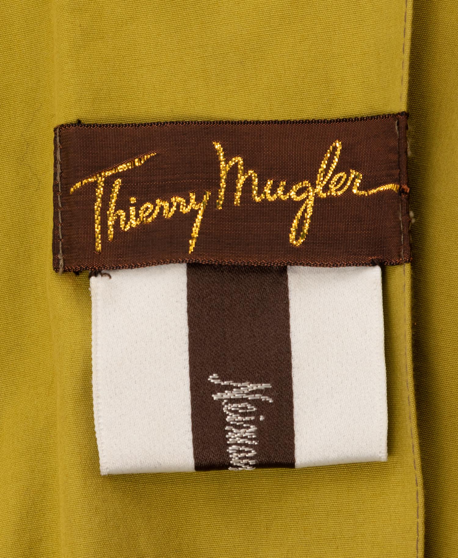 One Thierry Mugler Coat and a Jean Paul Gaultier Two Piece Pantsuit, 1980s