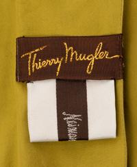 One Thierry Mugler Coat and a Jean Paul Gaultier Two Piece Pantsuit, 1980s