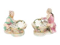 A Pair of German Porcelain Figural Sweetmeat Baskets