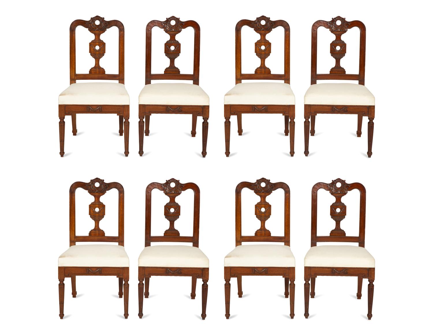 A Set of Eight Italian Walnut Dining Chairs