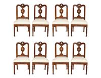 A Set of Eight Italian Walnut Dining Chairs