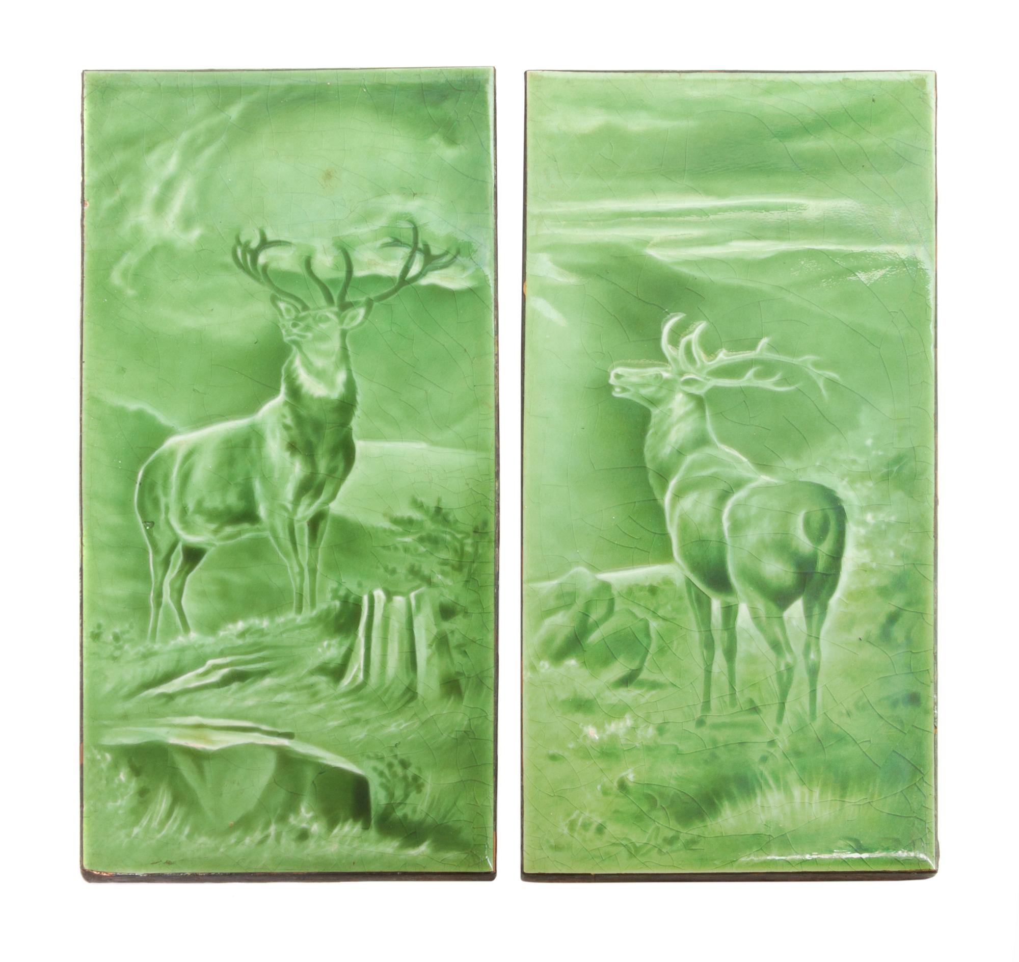 A Collection of Four Pottery Tiles Height of first pair 12 inches.