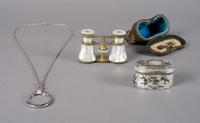 A Pair of French Mother-of-Pearl Opera Glasses, Height of first approximately 2 1/2 inches.
