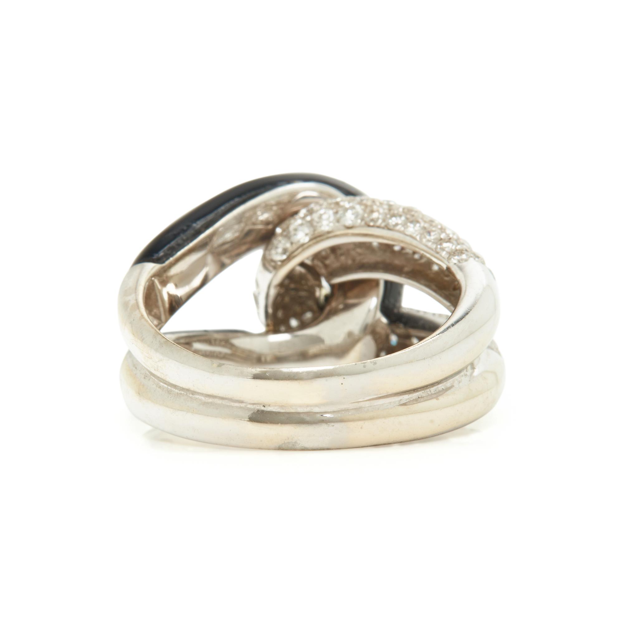 WHITE GOLD, DIAMOND AND BLACK ONYX RING