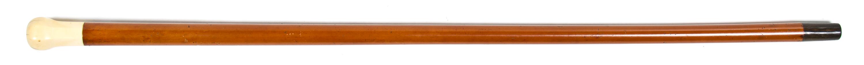 A Silver Inset Ivory and Wood Walking Stick, Height overall 35 1/4 x height of handle 2 1/4 inches.
