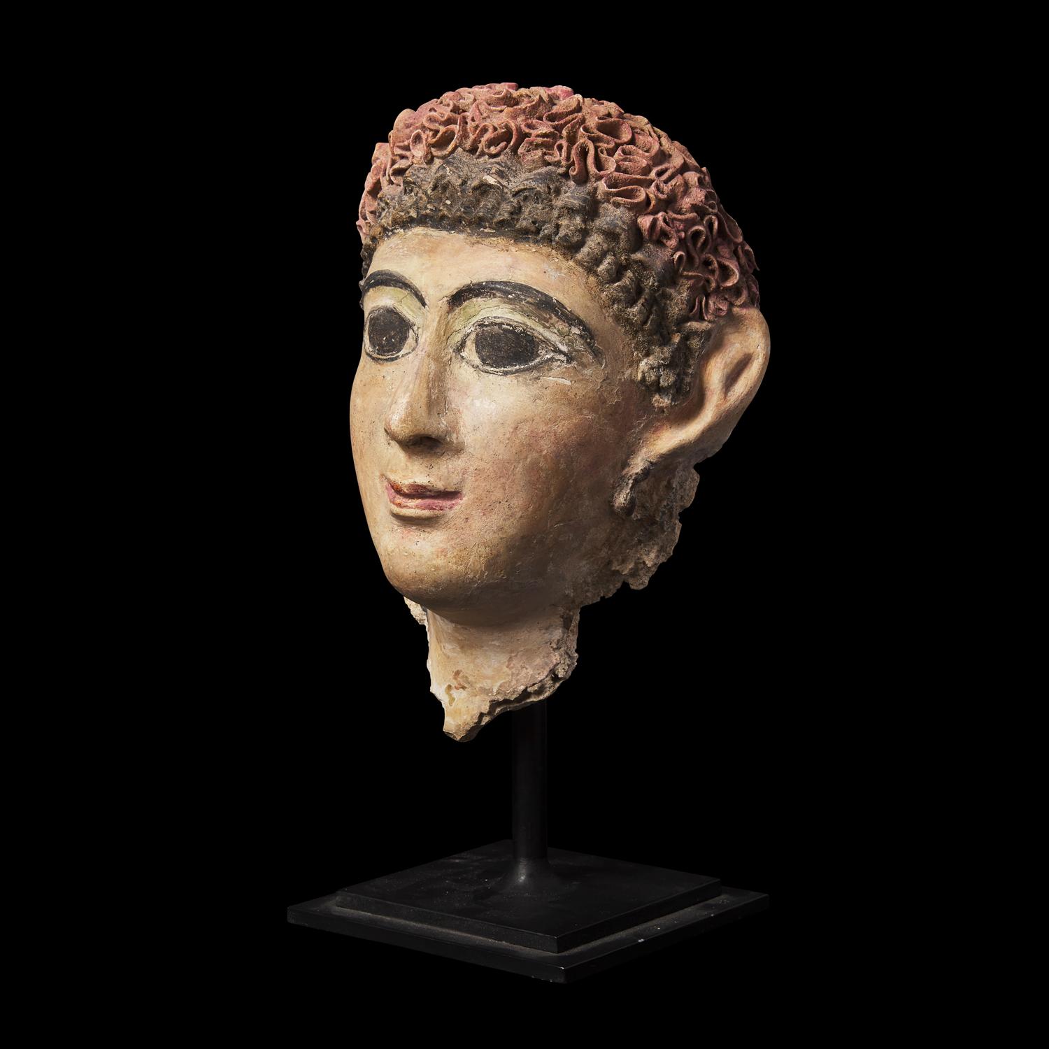 An Egyptian Cartonnage Mummy Mask